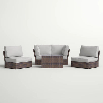 Comfortable modern patio rattan sectional set with cushions and a wicker coffee table on Tampa Home & Garden Store