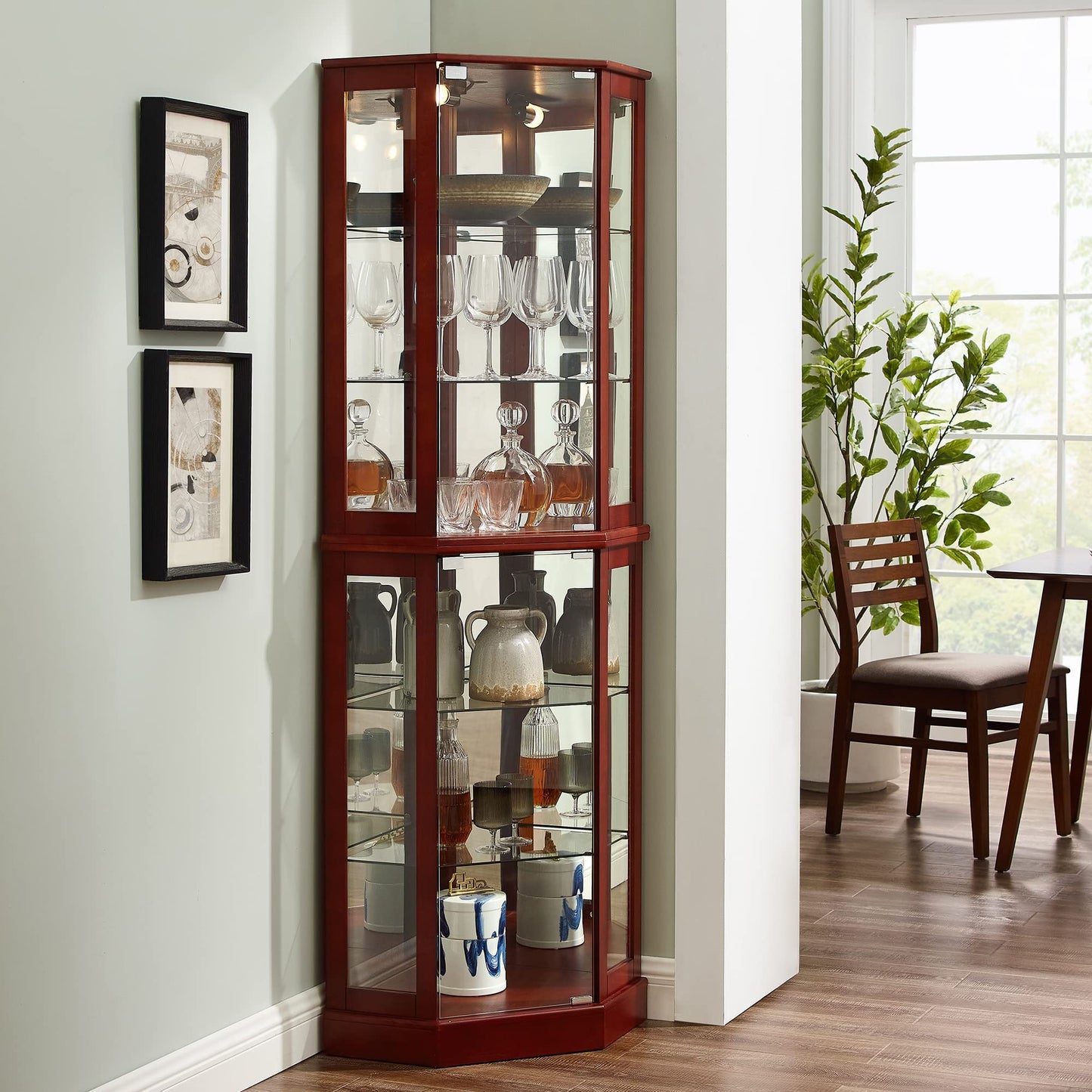 Red six-shelf corner curio cabinet with glass doors, interior lights and displayed glassware on Tampa Home & Garden Store