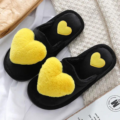 Cute Love Slippers by FLIPSTYLEZLLC black plush pair with yellow heart accents on Tampa Home & Garden Store