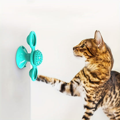 Teal windmill cat toy with suction cup and rotating spiked center ball for interactive play on Tampa Home & Garden Store
