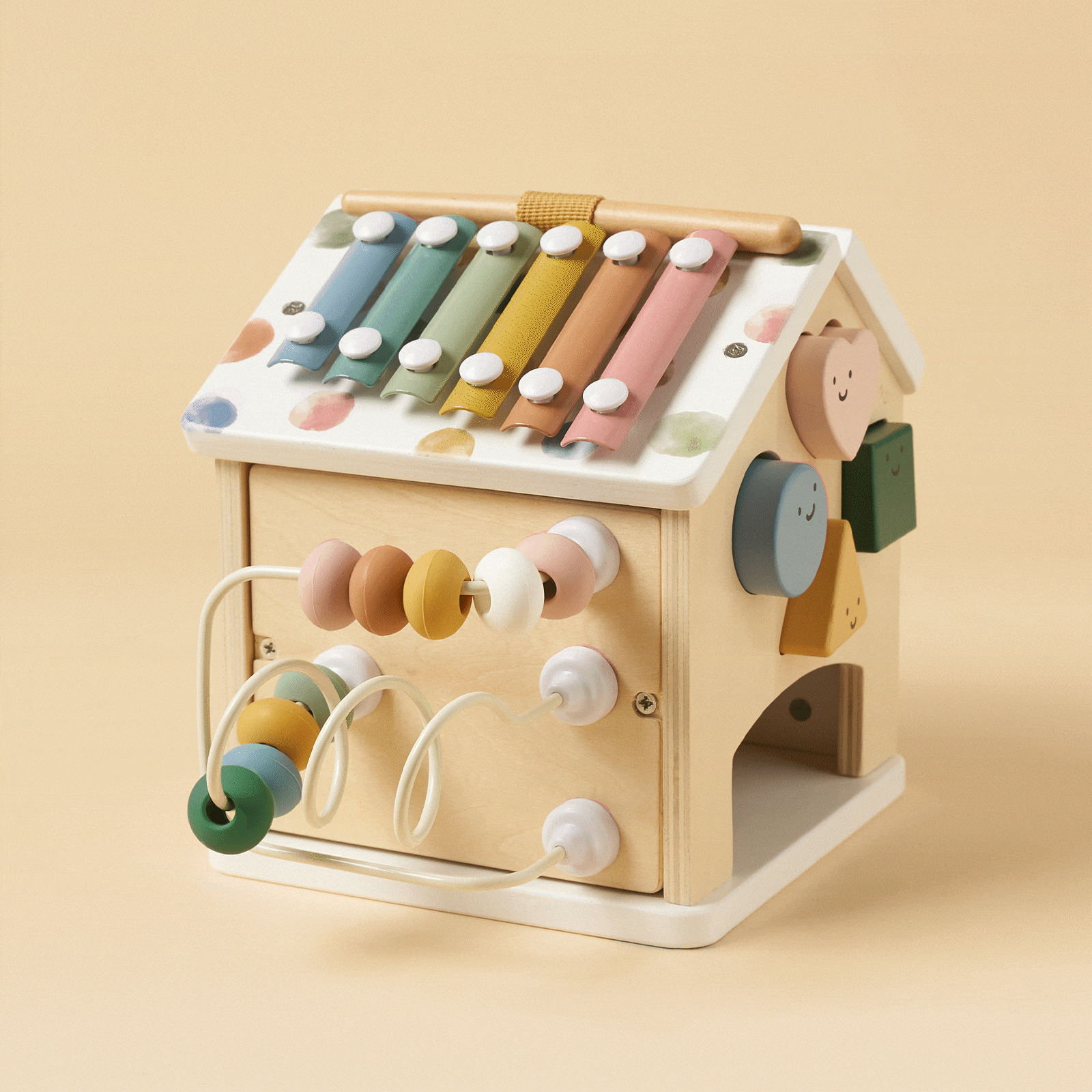 Tiny Land Cottage Morandi activity cube with pastel xylophone bars on Tampa Home & Garden Store