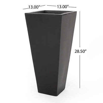 Outdoor modern cast stone planter in dark charcoal, tall tapered square silhouette on Tampa Home & Garden Store