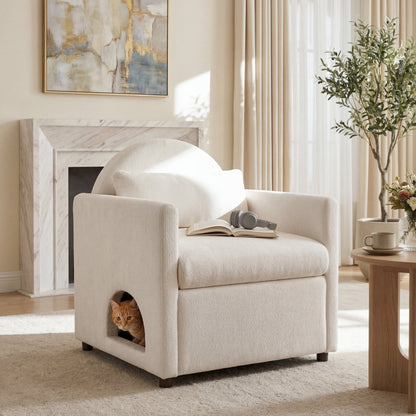 Beige pet-friendly accent chair with hidden pet nook by HouseOfZazla, cat peeks from nook on Tampa Home & Garden Store