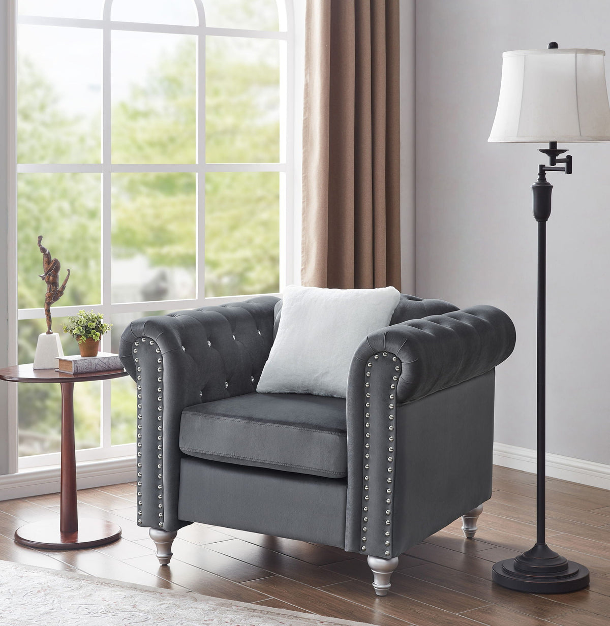 Contemporary lounge chair in charcoal velvet with faux jeweled tufting and nailhead trim on Tampa Home & Garden Store