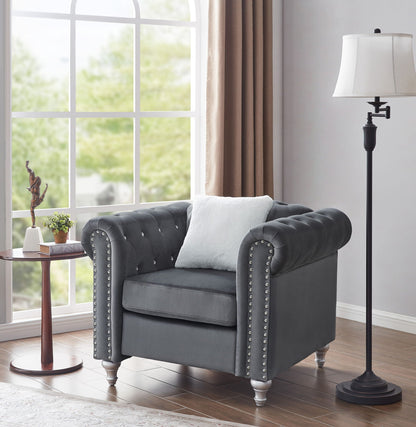 Contemporary lounge chair in charcoal velvet with faux jeweled tufting and nailhead trim on Tampa Home & Garden Store