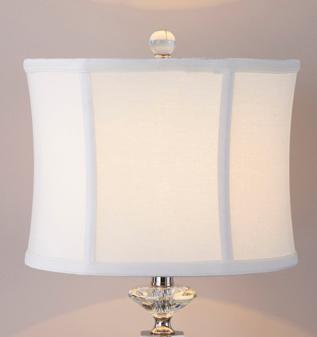 Table lamp with white fabric shade and clear crystal finial polished nickel base on Tampa Home & Garden Store