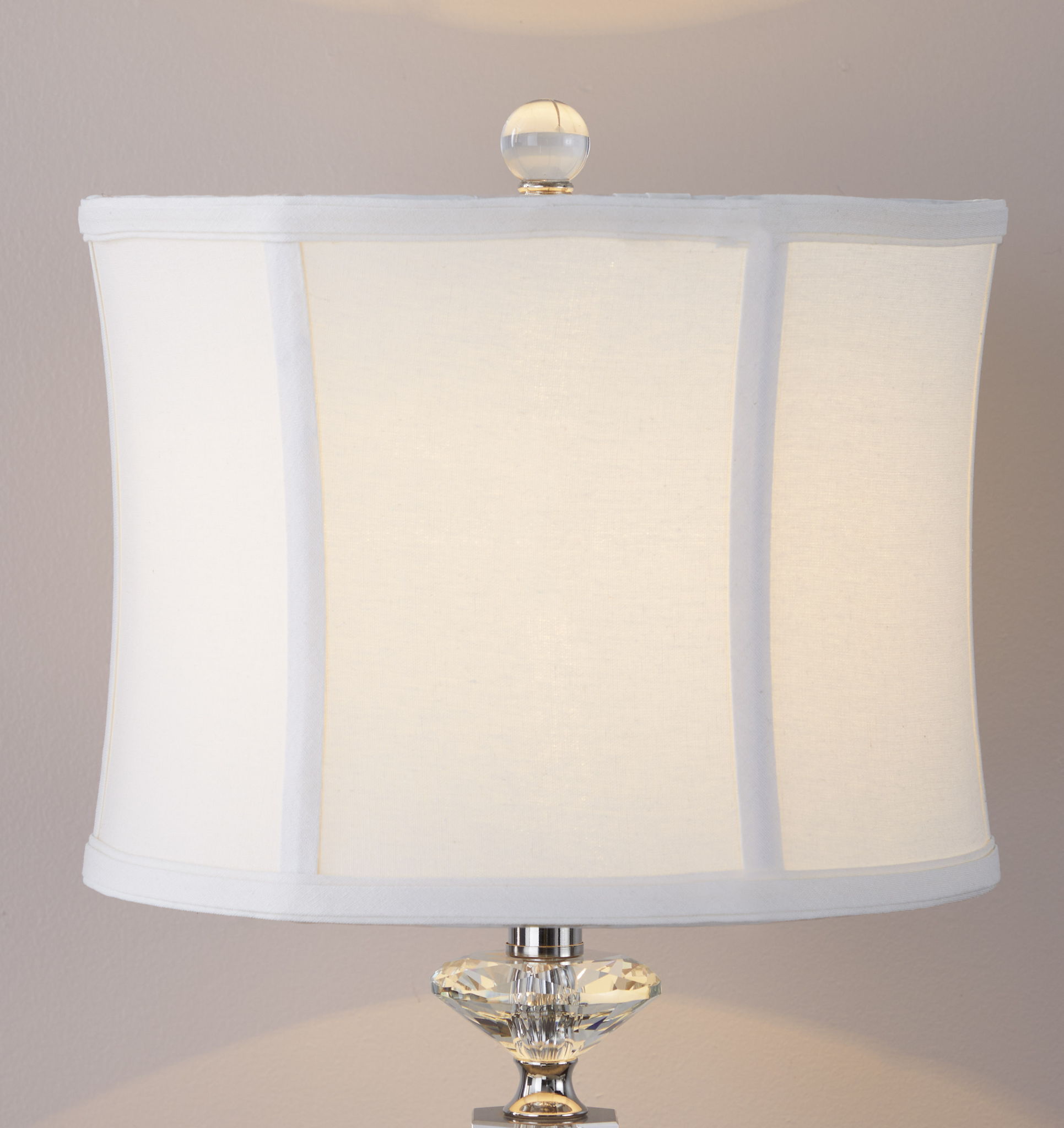 Table lamp with white fabric shade and clear crystal finial polished nickel base on Tampa Home & Garden Store