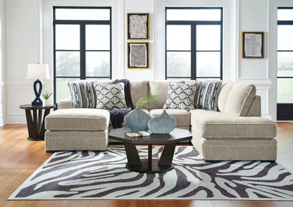 Calnita Sectional beige sofa with black-and-white cushions by Unique Piece Furniture on Tampa Home & Garden Store