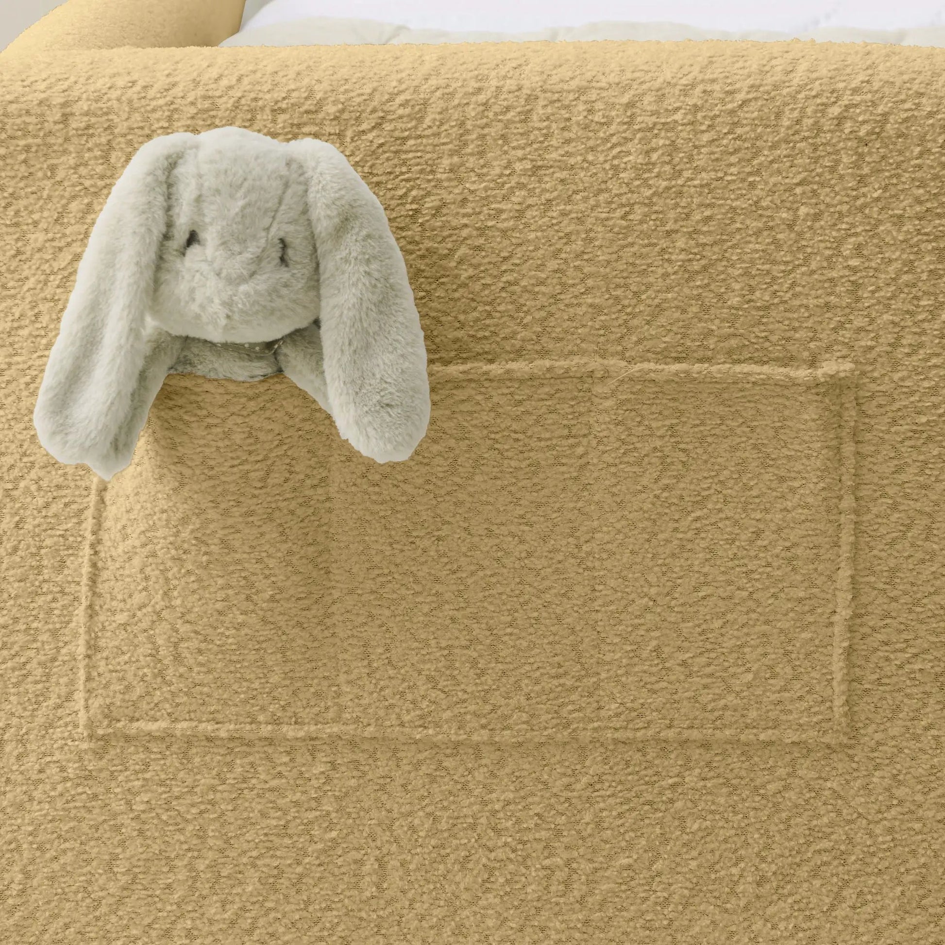 Cute rabbit-ear upholstered platform bed frame with safety rail in beige fabric on Tampa Home & Garden Store