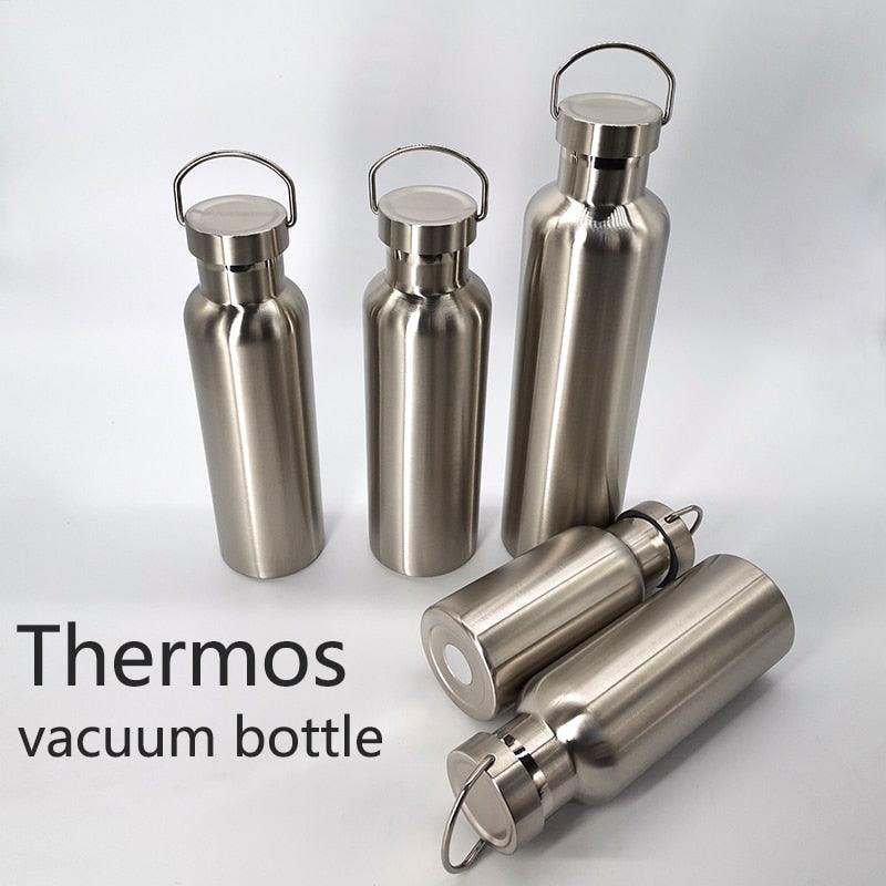 Five stainless steel vacuum insulated thermos bottles with handles in silver on Tampa Home & Garden Store