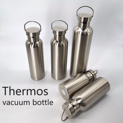 Five stainless steel vacuum insulated thermos bottles with handles in silver on Tampa Home & Garden Store