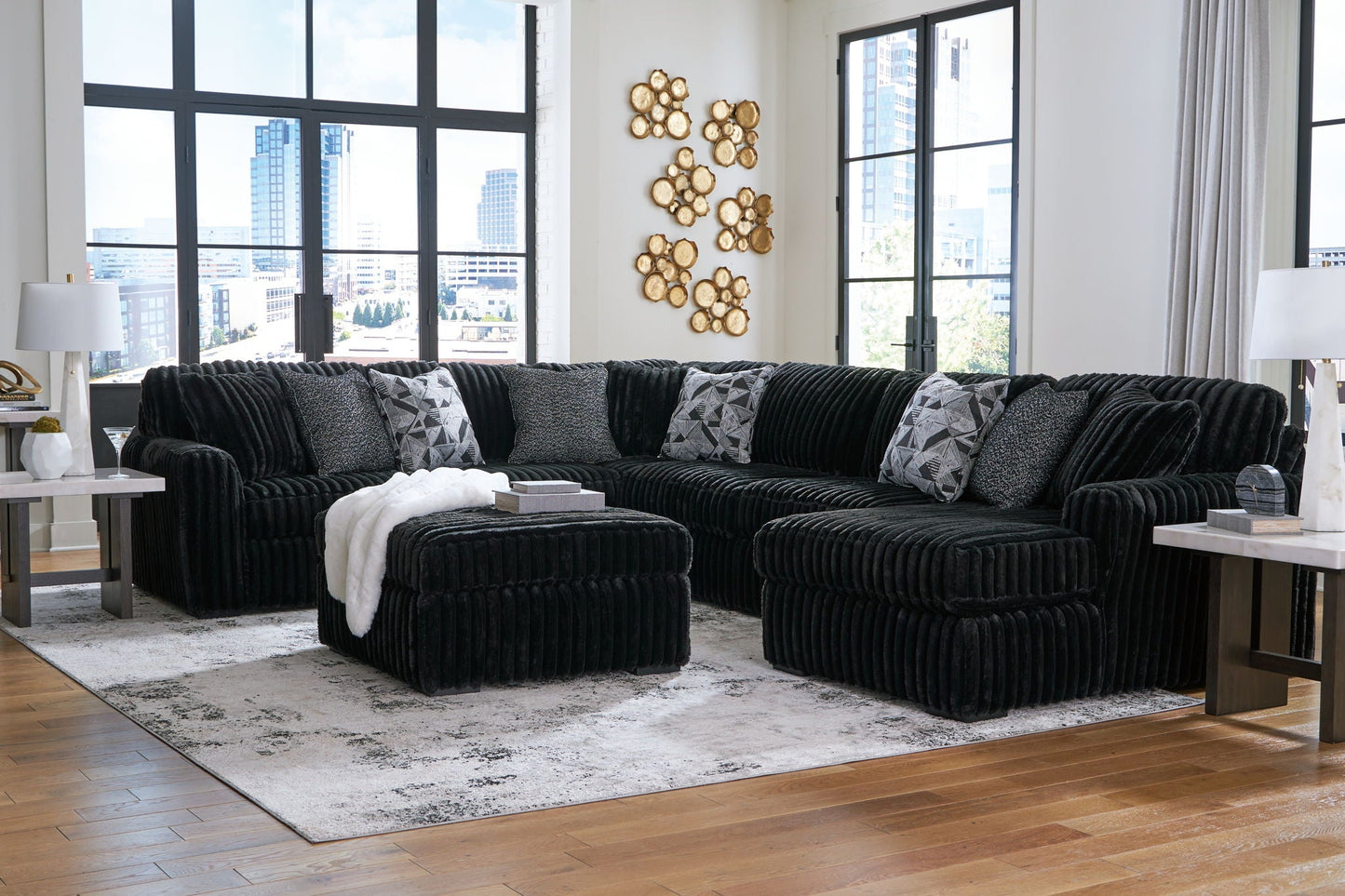 Midnight-Madness 4-piece sectional with black velvet upholstery and gray geometric pillows on Tampa Home & Garden Store