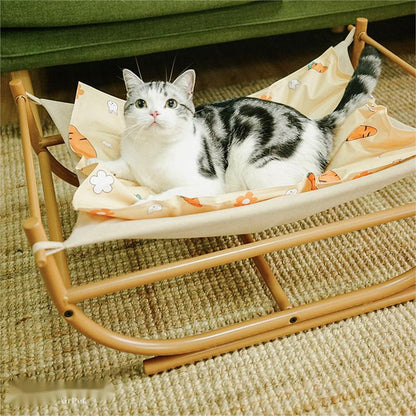 Iron Cat Hammock Pet Sofa Bed bamboo frame with orange-patterned fabric and resting cat on rug on Tampa Home & Garden Store