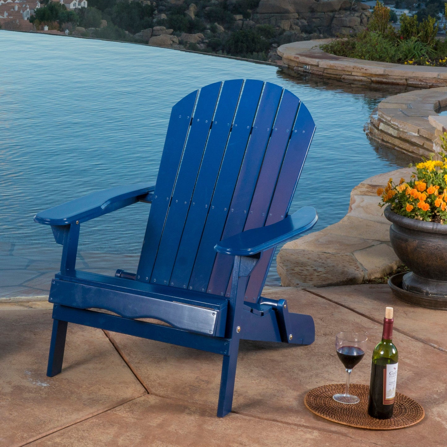 Malibu Adirondack chair blue HouseOfZazla by poolside with flowers on Tampa Home & Garden Store