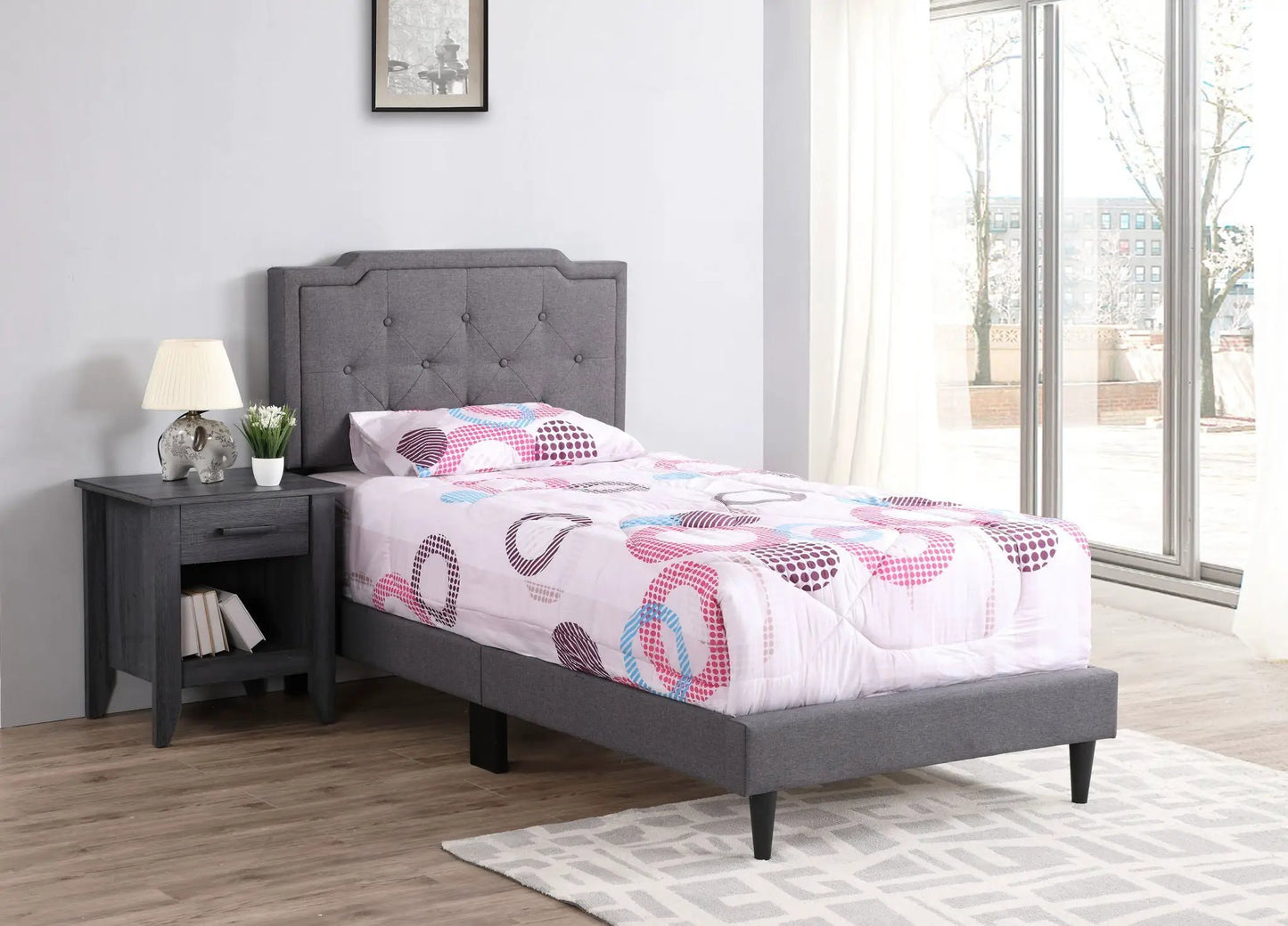 Button Tufted Bed in grey fabric with a tufted headboard for a cozy space on Tampa Home & Garden Store