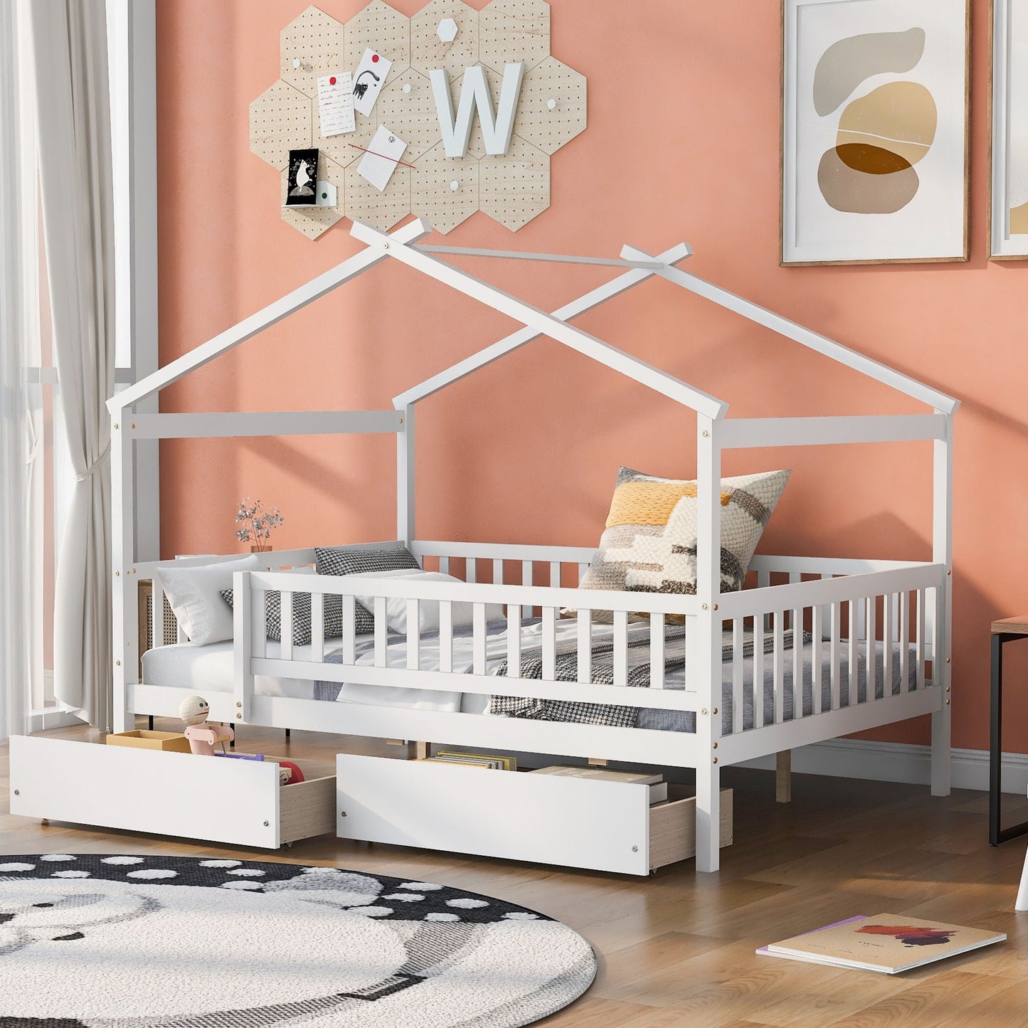 House bed with two under-bed drawers and sky roof storage in a peach nursery on Tampa Home & Garden Store