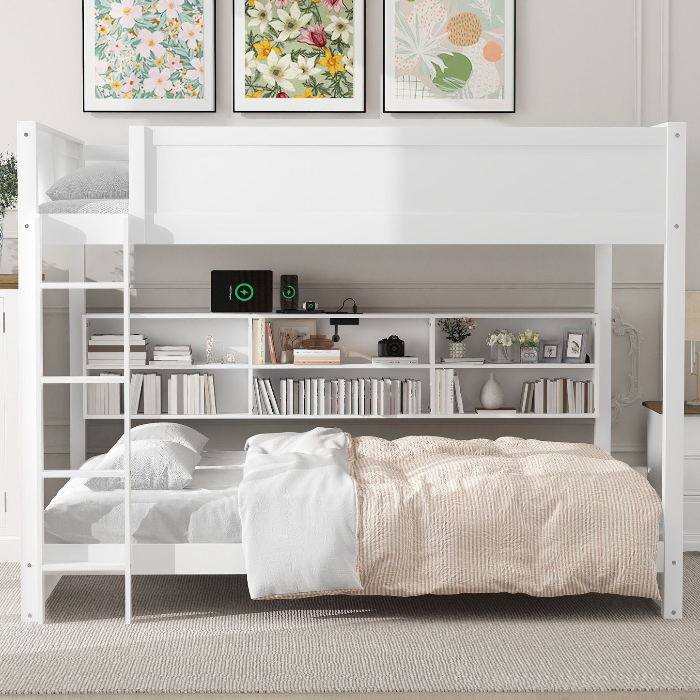White bunk bed with storage cabinets and USB ports, open underbed shelving with books on Tampa Home & Garden Store