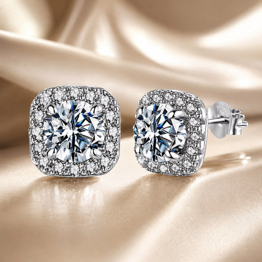 Pair of 925 sterling silver moissanite stud earrings with pavé halo and round center stones on Tampa Home & Garden Store