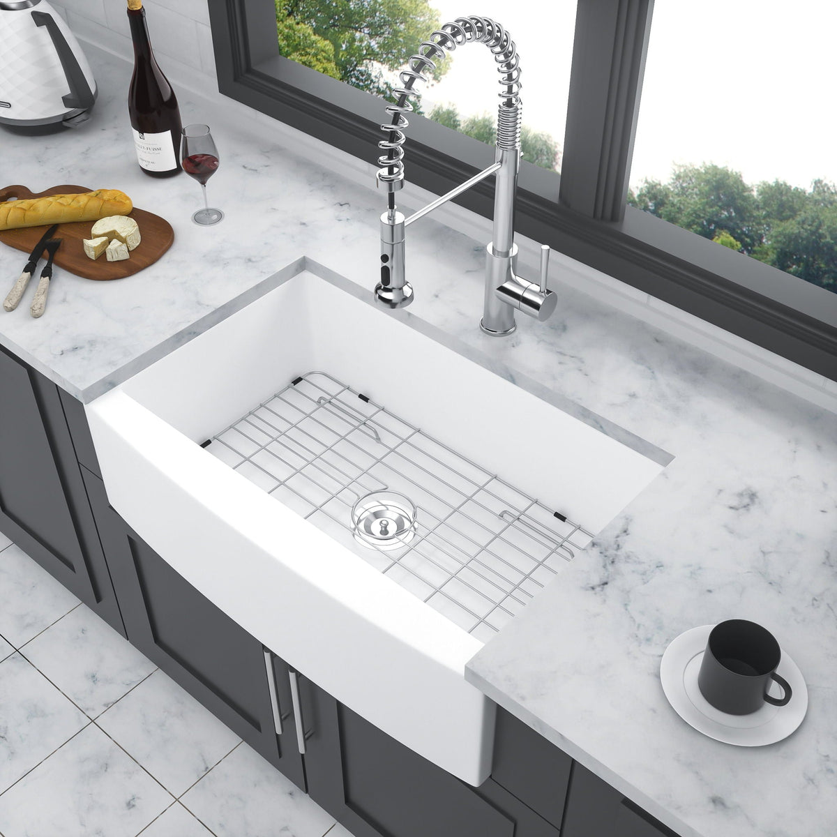 HouseOfZazla farmhouse apron-front sink, single bowl arch edge, chrome pull-down faucet on marble on Tampa Home & Garden Store