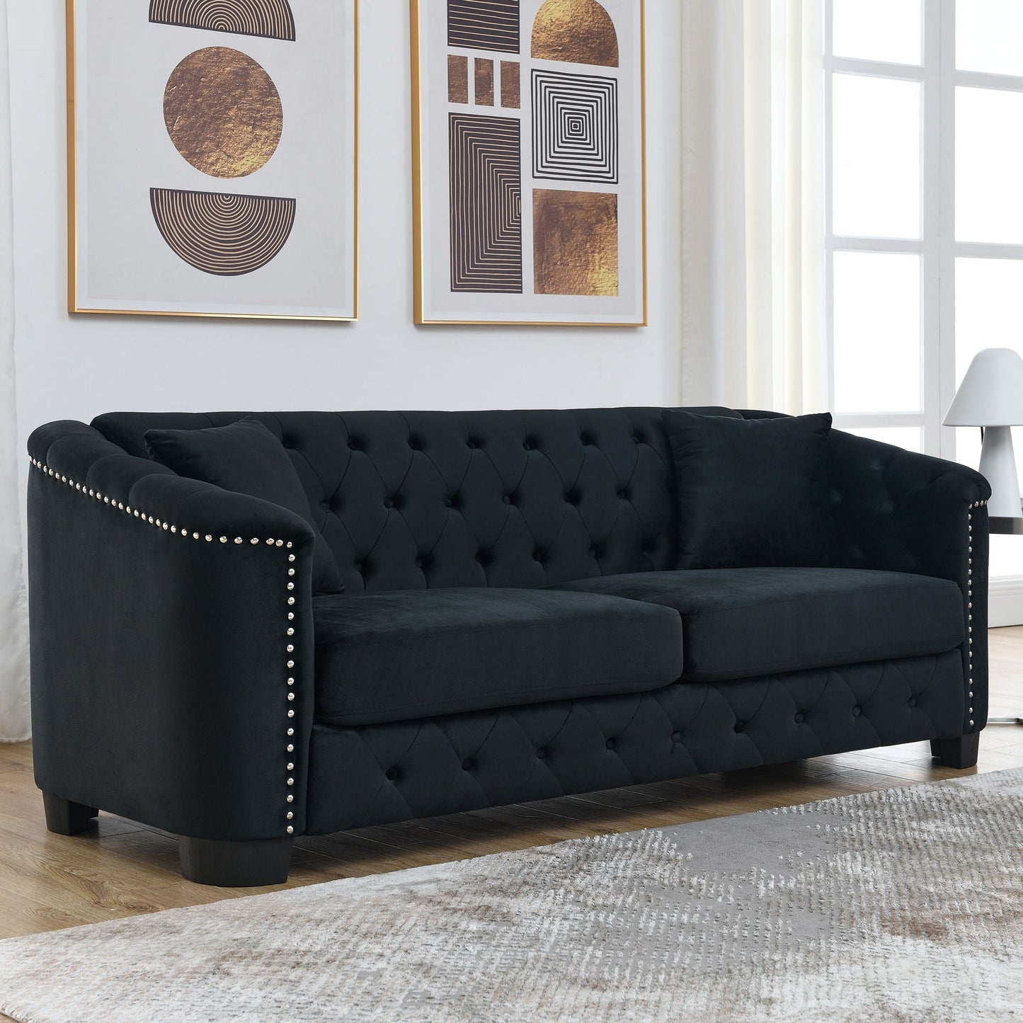 Modern Chesterfield sofa by HouseOfZazla with tufted back and nailhead trim in dark upholstery on Tampa Home & Garden Store