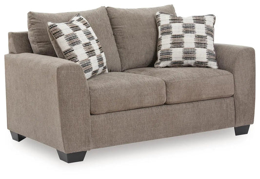 Loreo Loveseat by Unique Piece Furniture in taupe fabric with plaid cushions on Tampa Home & Garden Store
