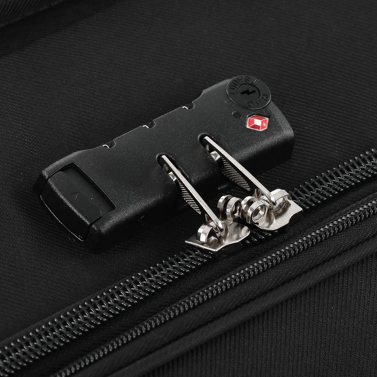 Black softside luggage close-up with TSA lock and metal zipper, HouseOfZazla on Tampa Home & Garden Store