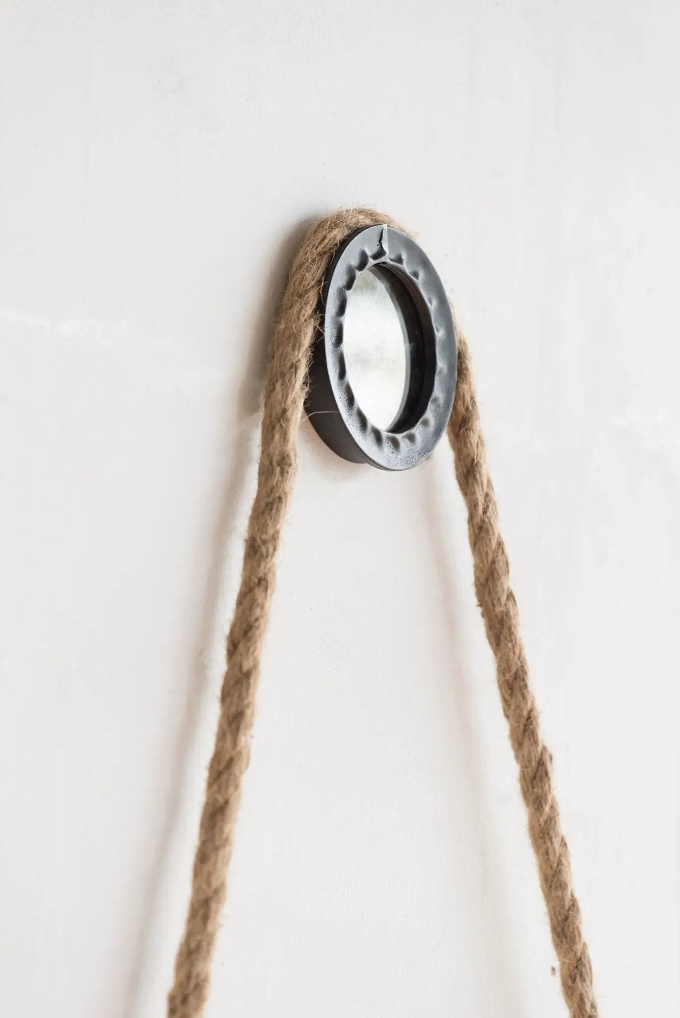 Handsome Cleveland wall mirror with rope strap in circular metal frame for wall decor on Tampa Home & Garden Store