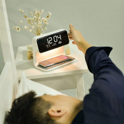Perfecsy 3-in-1 bedside lamp with wireless charging and LCD clock; white design with phone on pad on Tampa Home & Garden Store