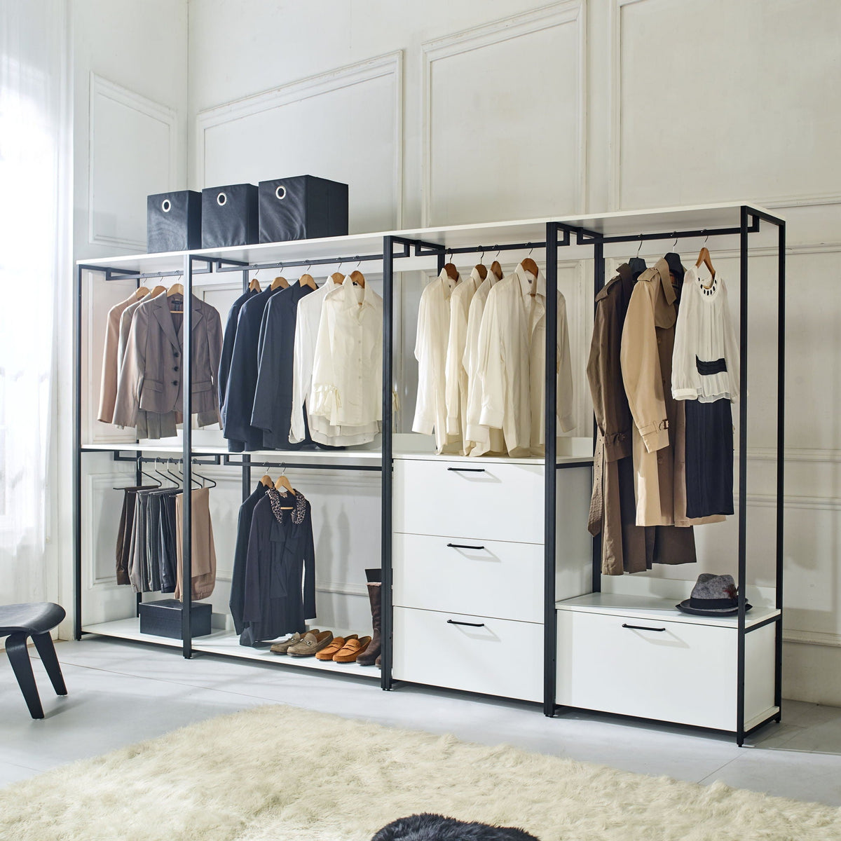 White walk-in closet with adjustable shelves and black powder-coated frame; triple wardrobes on Tampa Home & Garden Store
