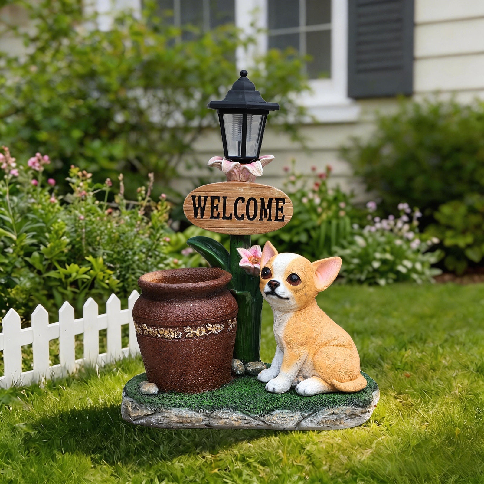 Sitting Corgi Dog Planter outdoor decor with a Welcome sign and black lantern on a garden stake on Tampa Home & Garden Store