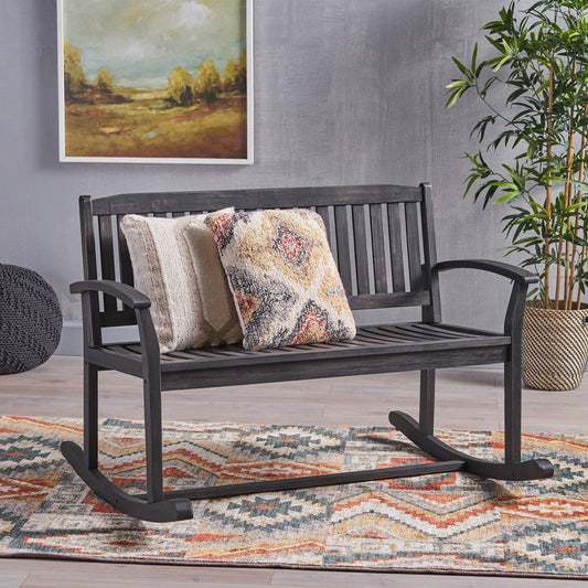 Baxter Rocking Loveseat Dark Gray outdoor slatted frame with cozy throw on Tampa Home & Garden Store