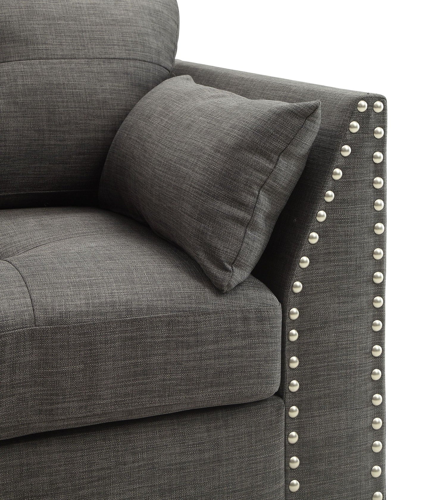 Laurissa armchair with three pillows in light charcoal fabric and metal studded arms on Tampa Home & Garden Store