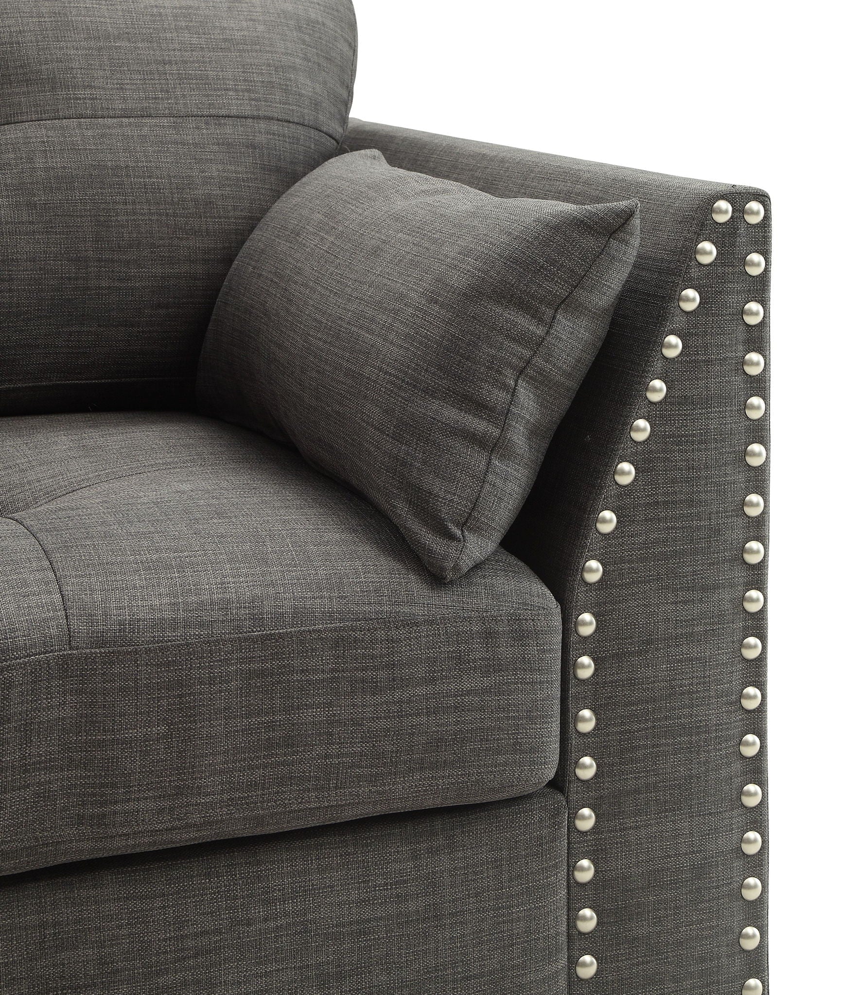 Laurissa armchair with three pillows in light charcoal fabric and metal studded arms on Tampa Home & Garden Store