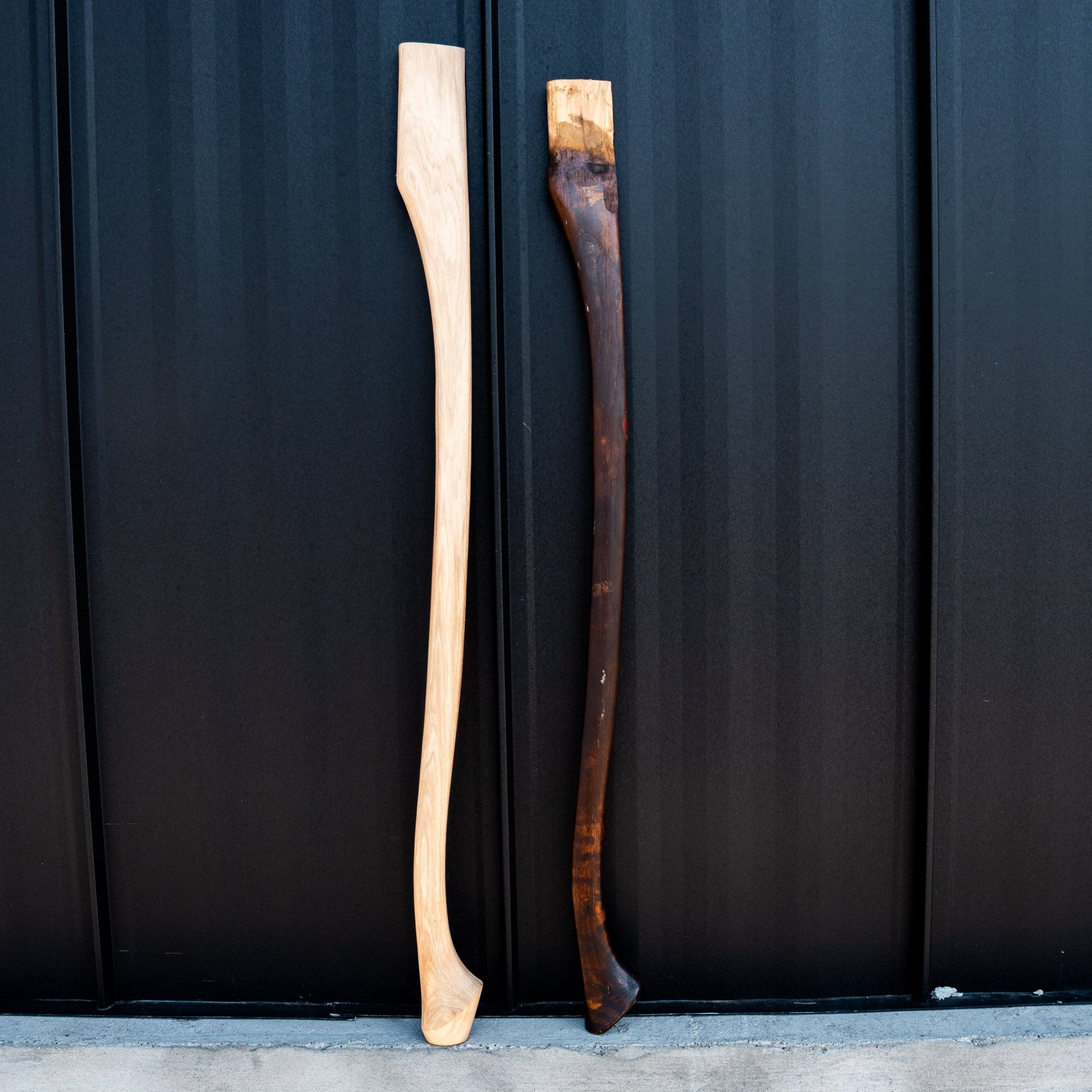 Whiskey River Premium Heritage 36C 36in axe handle, two wooden handles shown: light natural and dark stained on Tampa Home & Garden Store
