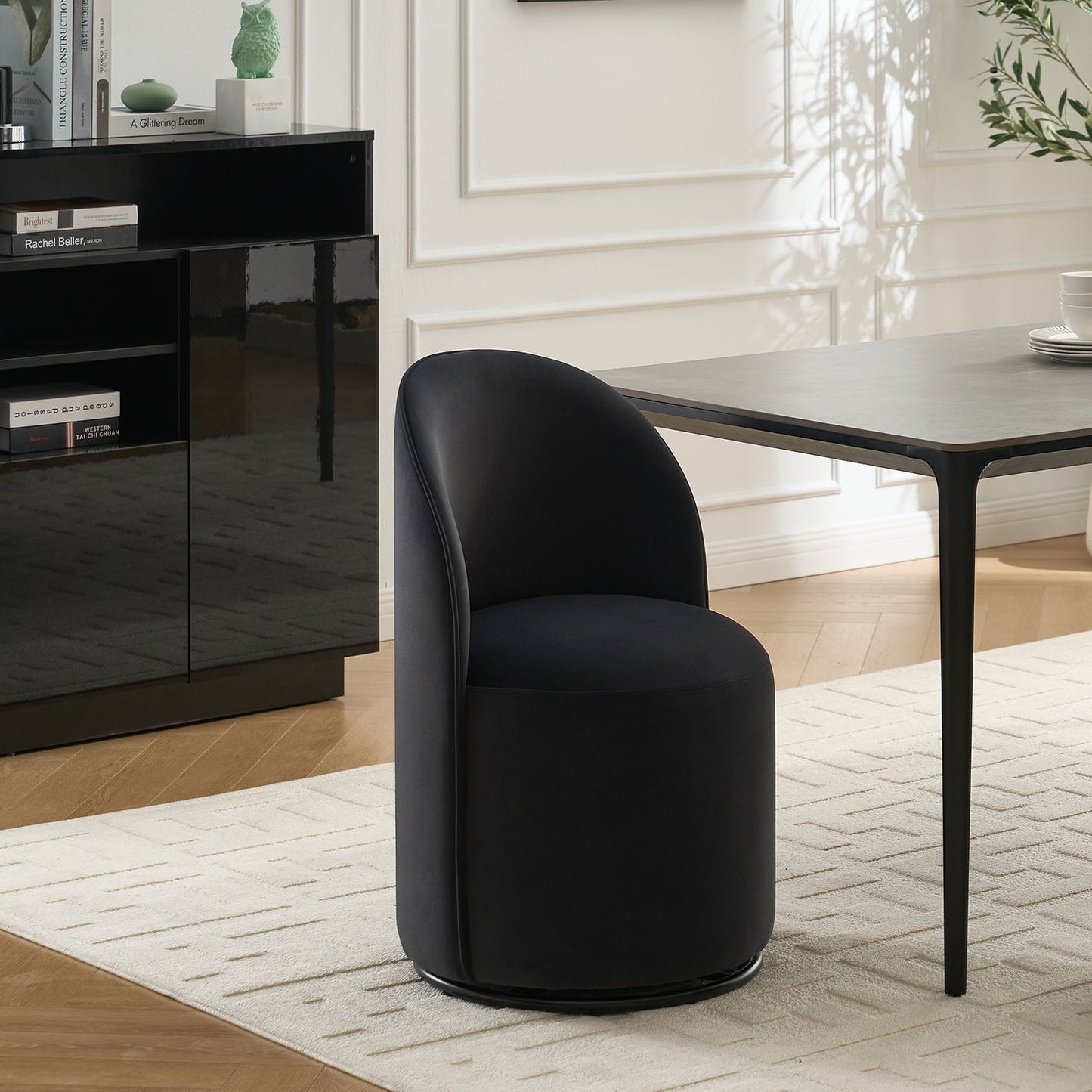 360 Degree Swivel Armless Dining Barrel Chair with black faux leather upholstery and metal base on Tampa Home & Garden Store