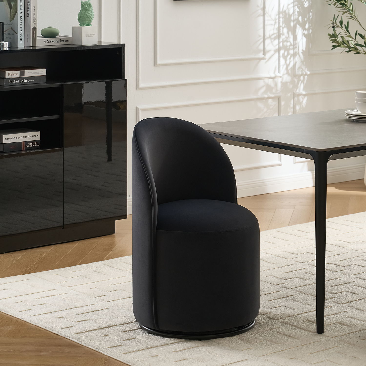 360 Degree Swivel Armless Dining Barrel Chair with black faux leather upholstery and metal base on Tampa Home & Garden Store
