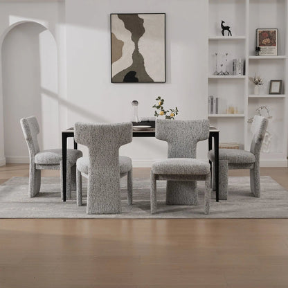Unique Piece Furniture armless curved-back accent chairs in gray fabric around dining table on Tampa Home & Garden Store