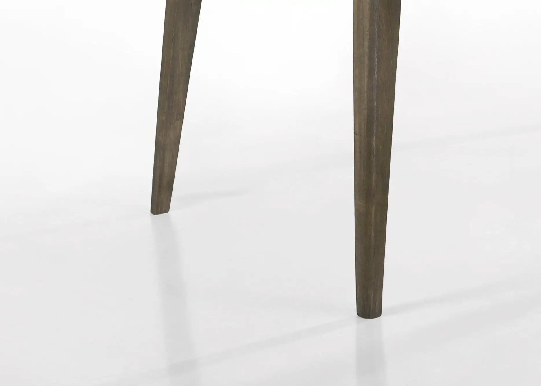 Bistro dining table leg close-up; dark brown tapered wood legs, mid-century modern style on Tampa Home & Garden Store
