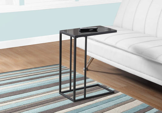 C-Shaped Accent Table with black glass top and metal frame beside white sofa on Tampa Home & Garden Store