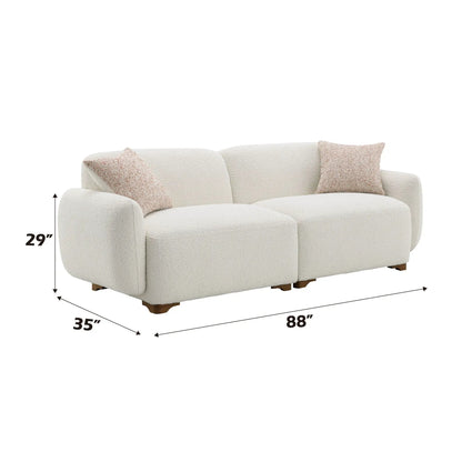Darius Boucle Sofa with 2 Toss Pillows in beige by Unique Piece Furniture on Tampa Home & Garden Store