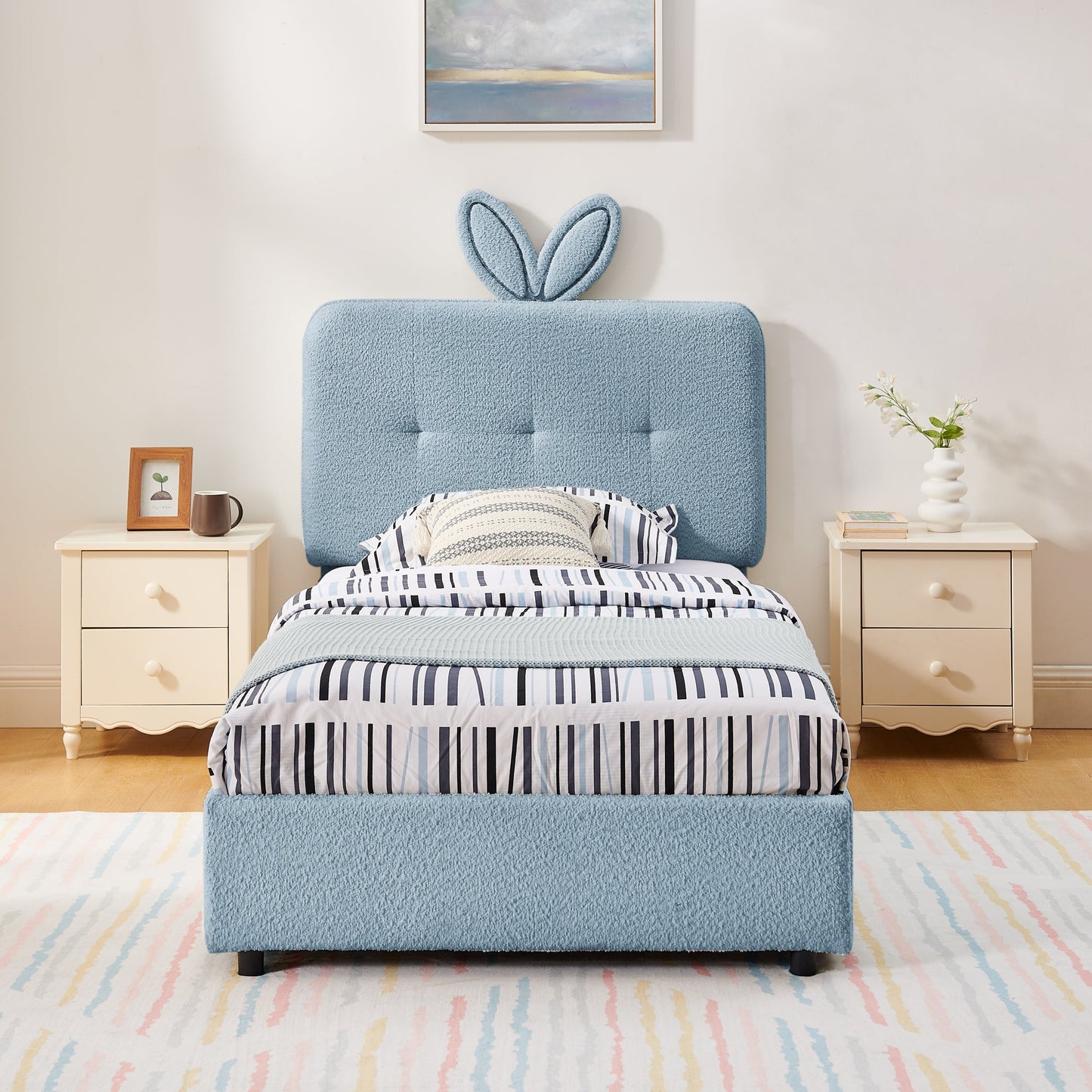 Twin size kids upholstered bed with oversized rabbit ear headboard in light blue fabric on Tampa Home & Garden Store