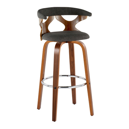 Mid Century Modern swivel barstool with padded dark gray upholstery and curved wood legs on Tampa Home & Garden Store