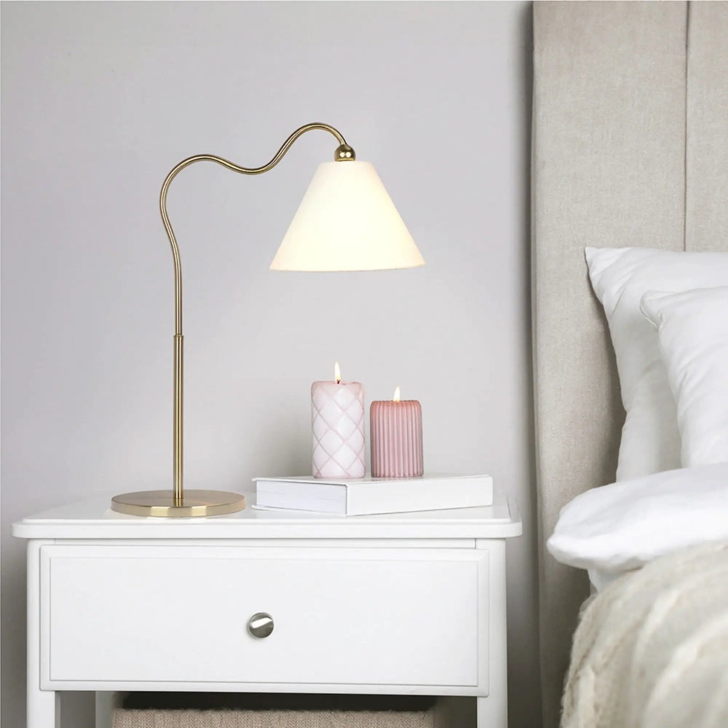 Ornate ring-base curved table lamp with gold finish and white triangle shade on Tampa Home & Garden Store