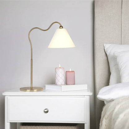 Ornate ring-base curved table lamp with gold finish and white triangle shade on Tampa Home & Garden Store