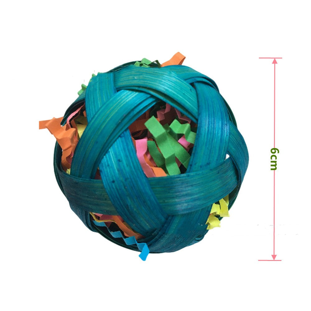Natural bamboo woven bird toy ball in teal with colorful shredded fillers foraging on Tampa Home & Garden Store