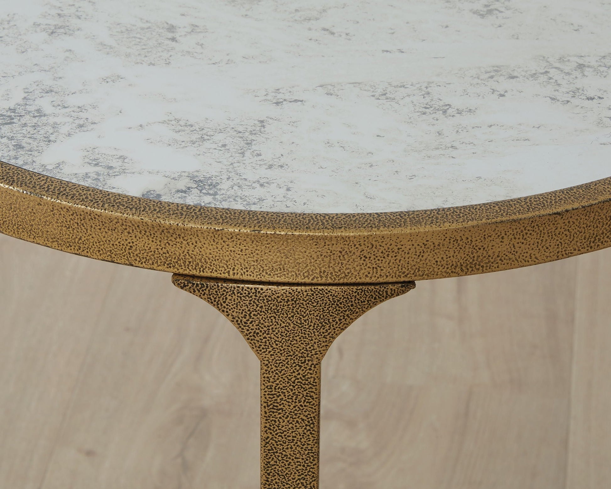 Korajane coffee table, round with white marble-top and hammered gold base on Tampa Home & Garden Store