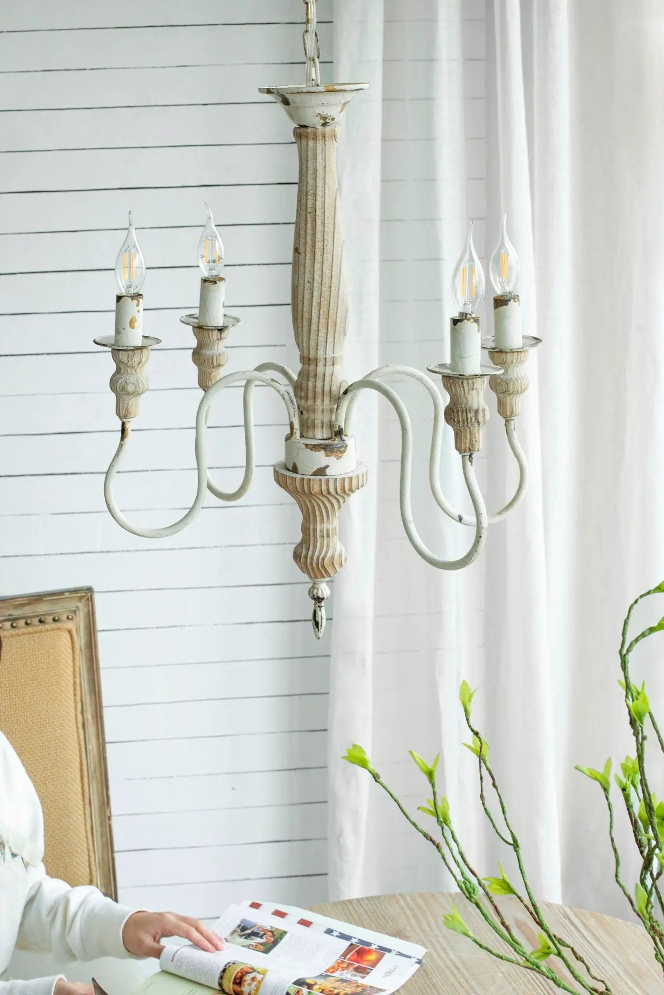 Cream white 4-light chandelier with distressed wood stem and candle bulbs, hanging chain on Tampa Home & Garden Store