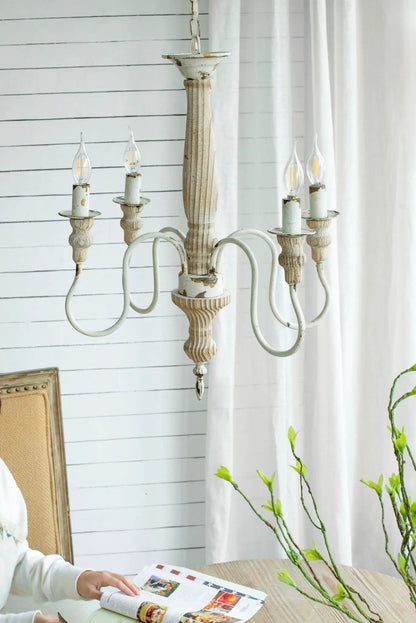 Cream white 4-light chandelier with distressed wood stem and candle bulbs, hanging chain on Tampa Home & Garden Store