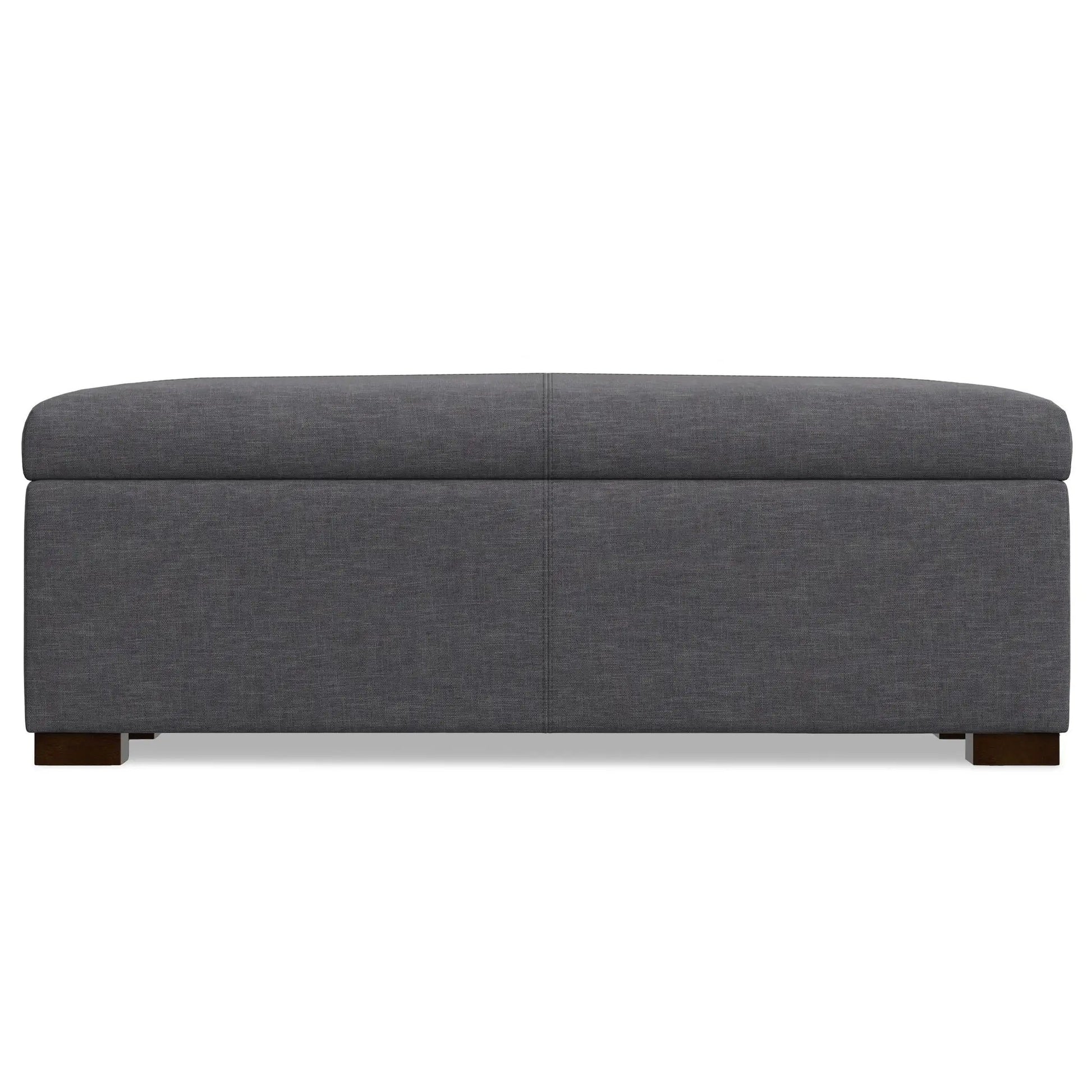 Gabbie storage ottoman upholstered in dark gray fabric with wooden legs on Tampa Home & Garden Store