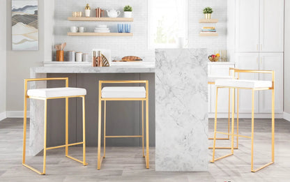 Pair of Fuji Contemporary barstools with gold frames and white cushions in a modern kitchen on Tampa Home & Garden Store